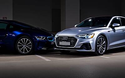 BMW i5 e Audi A6 e-tron, confronto tra berline elettriche di lusso.