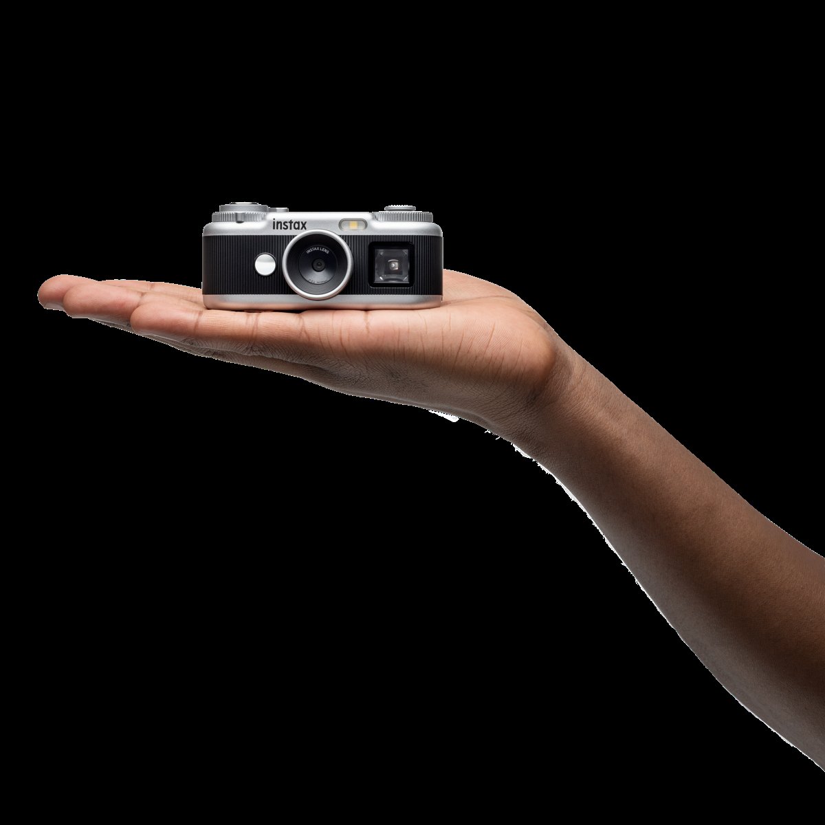 260528 instax Pal 2   Promotional images   17 Pal 2 in the palm of hand   Black 2282